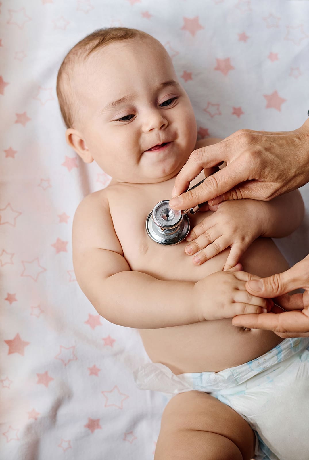 doctor-listening-to-heartbeat-of-baby-2023-11-27-04-53-16-utc